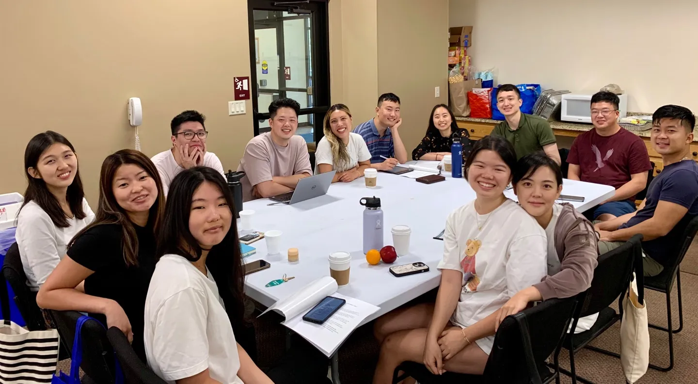 Students studying the Bible together